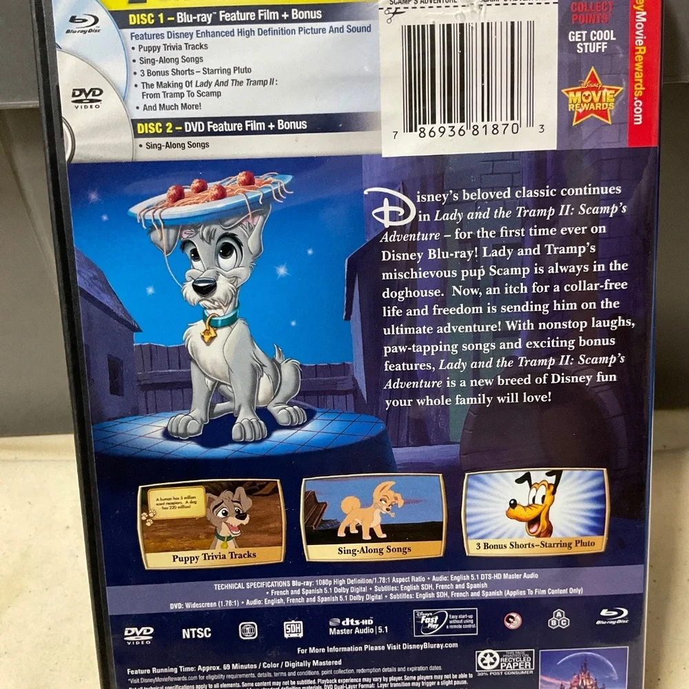 DVD and Blu Ray Disc - Lady and the Tramp II.    V107